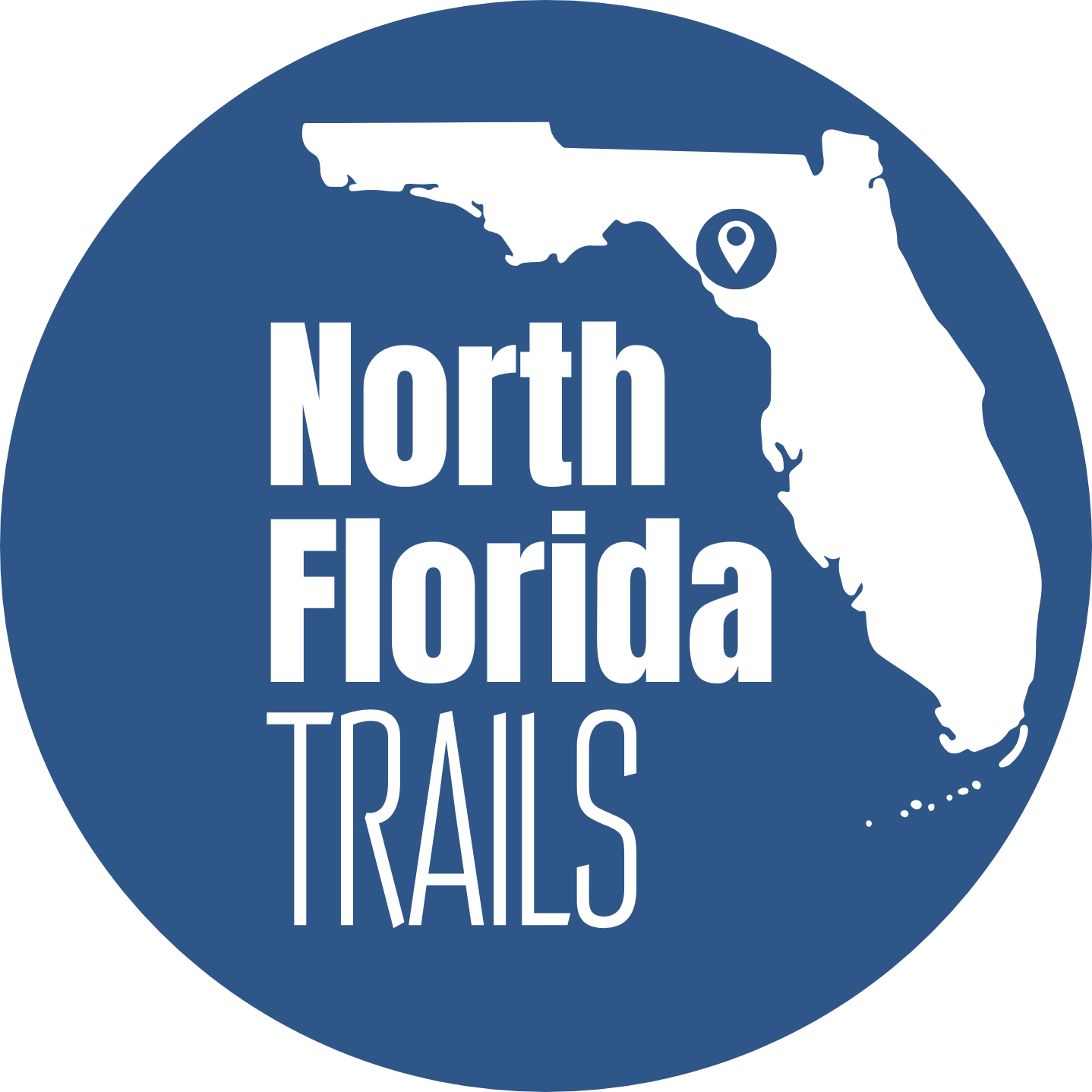 A green circle with the words north florida trails on it