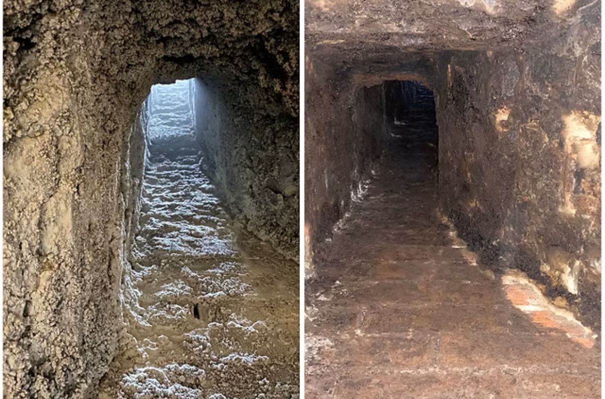 Two stone staircases lead into tunnels. The left is brighter with a wider opening;