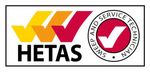 HETAS logo: Three checkmarks in yellow, orange, and red, next to a circular logo with a checkmark