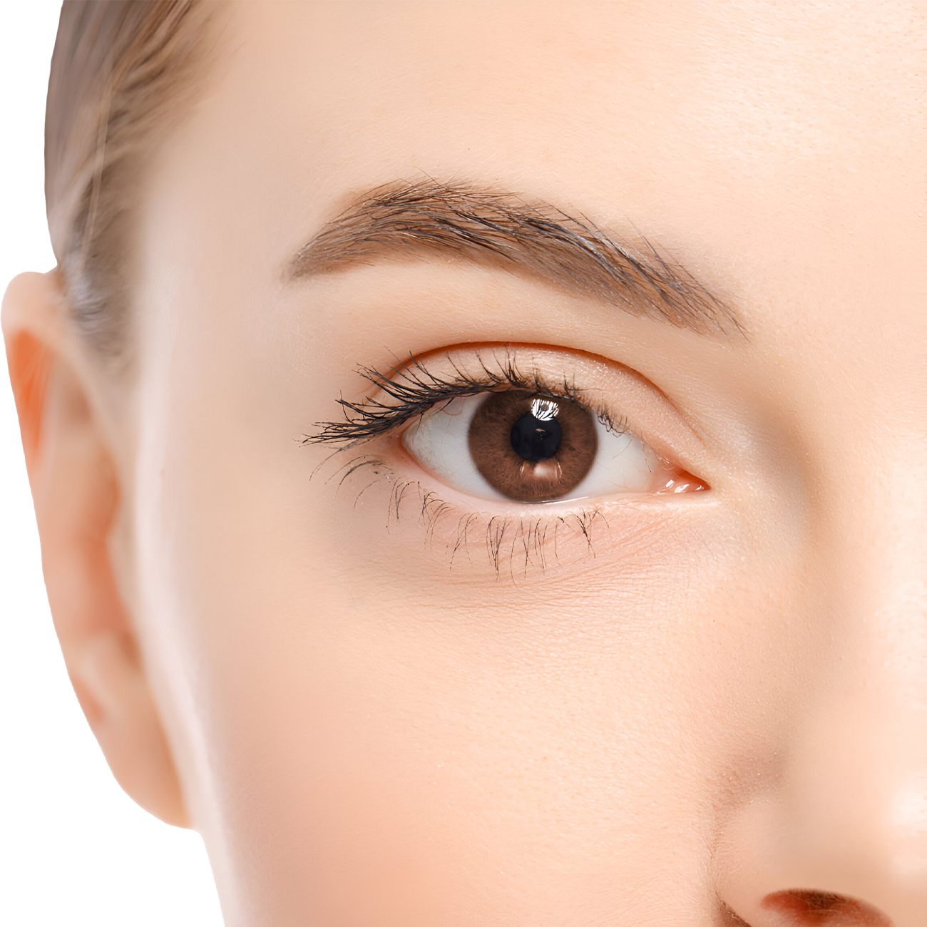 Close-up of a person's eye, brown iris, light skin, arched eyebrow, and part of the face.