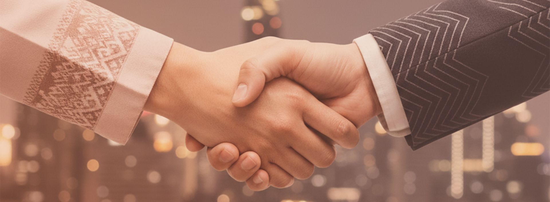 Two people shaking hands, a business deal in progress, with a city skyline backdrop.