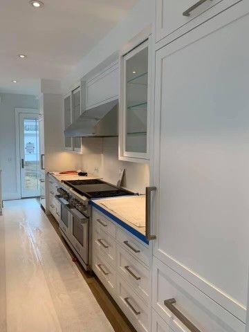 A Kitchen With White Cabinets — Cape Coral, FL — X45 Cabinets