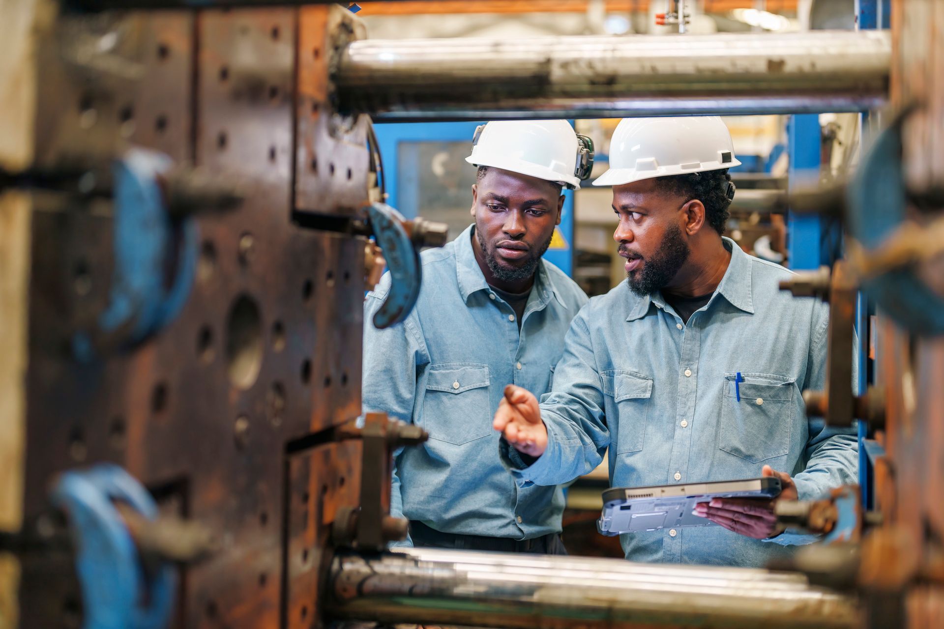Men Instructing on Machinery — Olympia Fields. IL — United People's Action Chamber of Commerce, Inc. (UPACC)