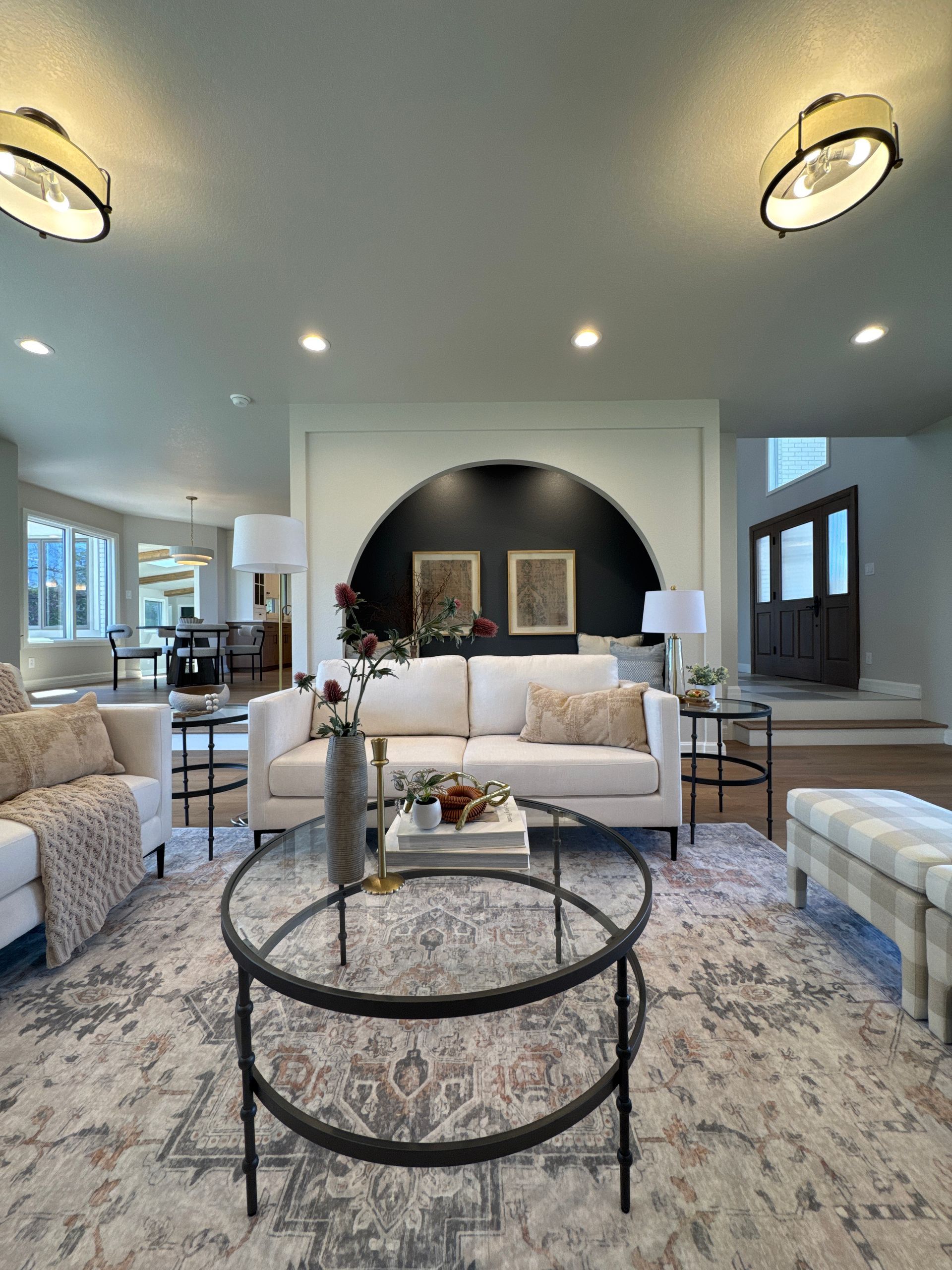 A bunch of different colored papers are laying on a table.