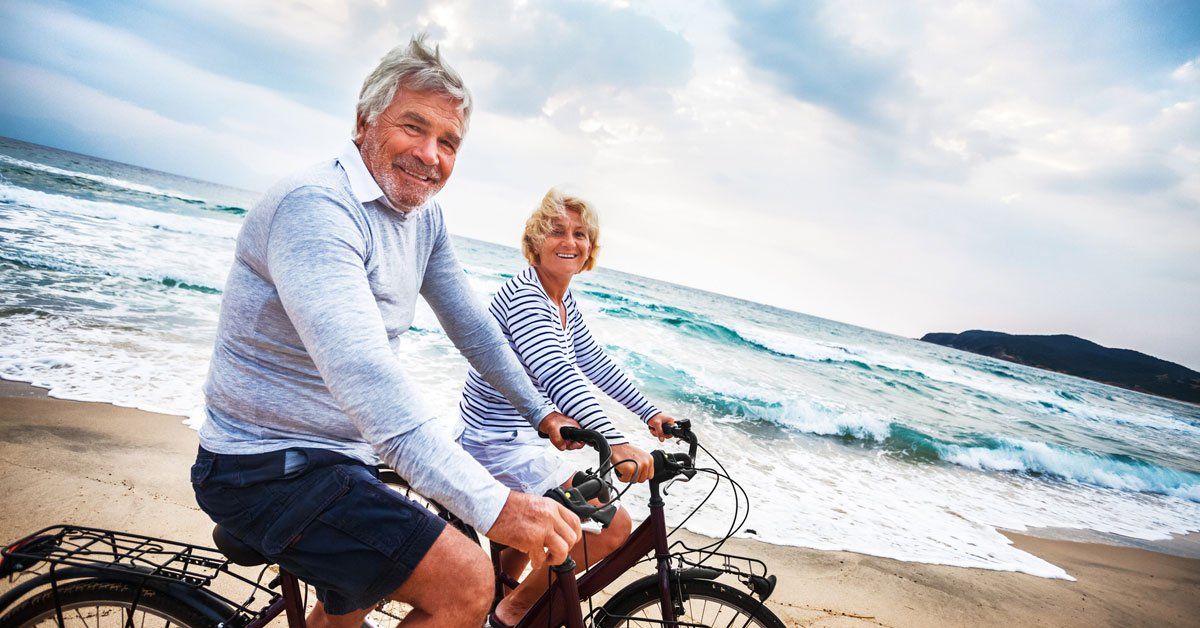 an old couple cycling