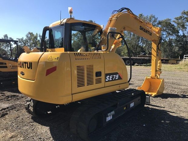 Yellow Shantui SE75 excavator parked outdoors.— Northern Heavy Machinery in Mount Louisa, QLD