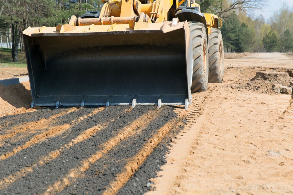 Yellow Bulldozer Smoothing a Dirt Road Surface — Northern Heavy Machinery in Cape York, QLD