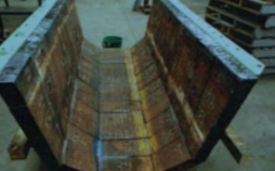 Large Trough Lined With Weathered, Rectangular Metal Plates — Northern Heavy Machinery in Mount Louisa, QLD