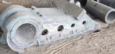 Gray Metal Casting With Several Holes and a Large Circular Opening — Northern Heavy Machinery in Mount Louisa, QLD