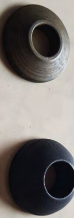 Two Metal Washers With a Central Hole, One Gray and One Black — Northern Heavy Machinery in Mount Louisa, QLD