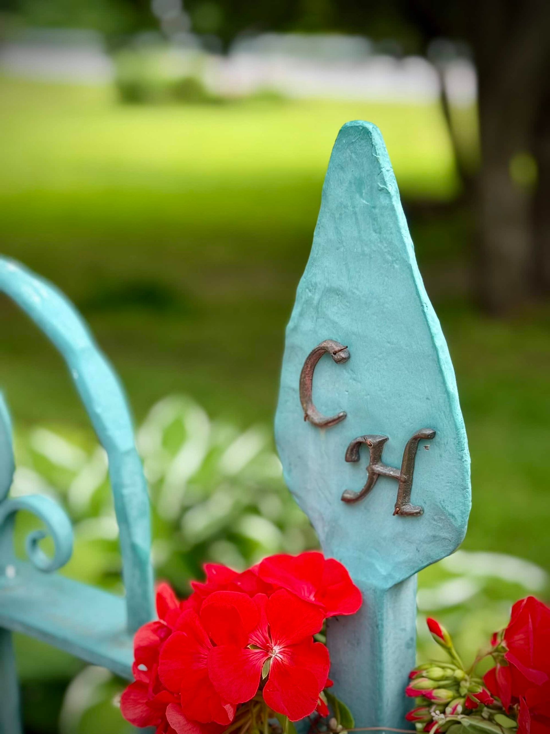 Teal fence post with brown 
