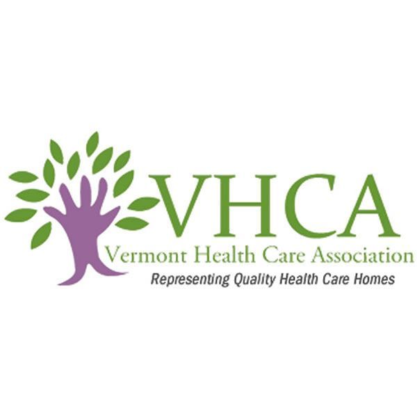 Logo of the Vermont Health Care Association. Features a purple hand-tree with green leaves and text