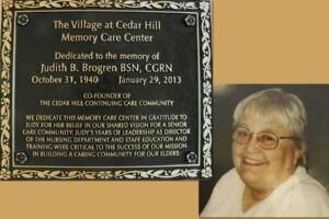 Plaque honoring Judith B. Brogren, with her photo.  Dedicated to her memory for her work in elder care.