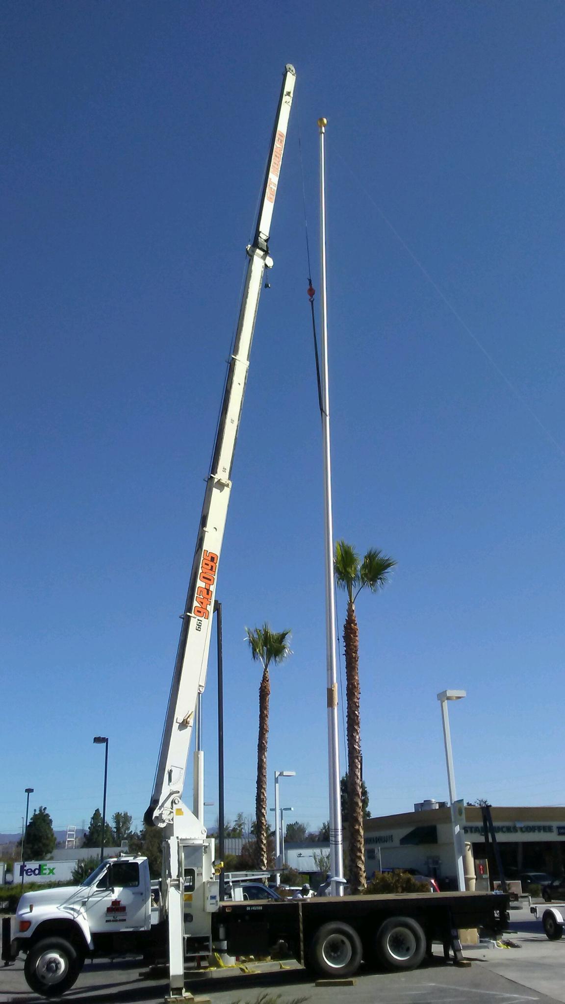 Crane and a Big Metal Post — Lancaster, CA — Get Hooked Crane Service