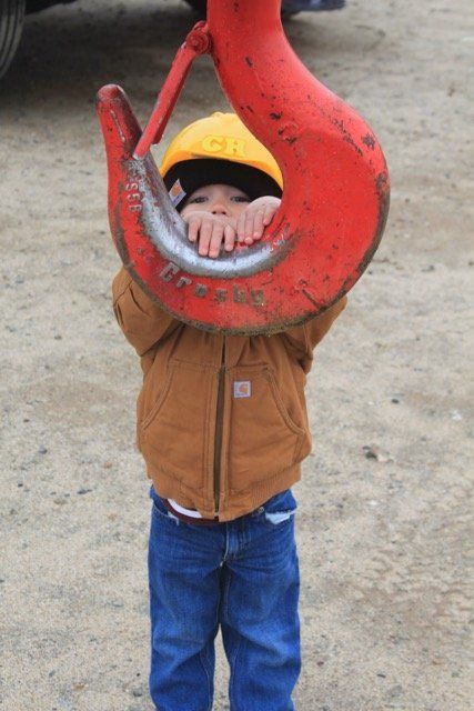 Kid Holding a Crane Hook — Lancaster, CA — Get Hooked Crane Service