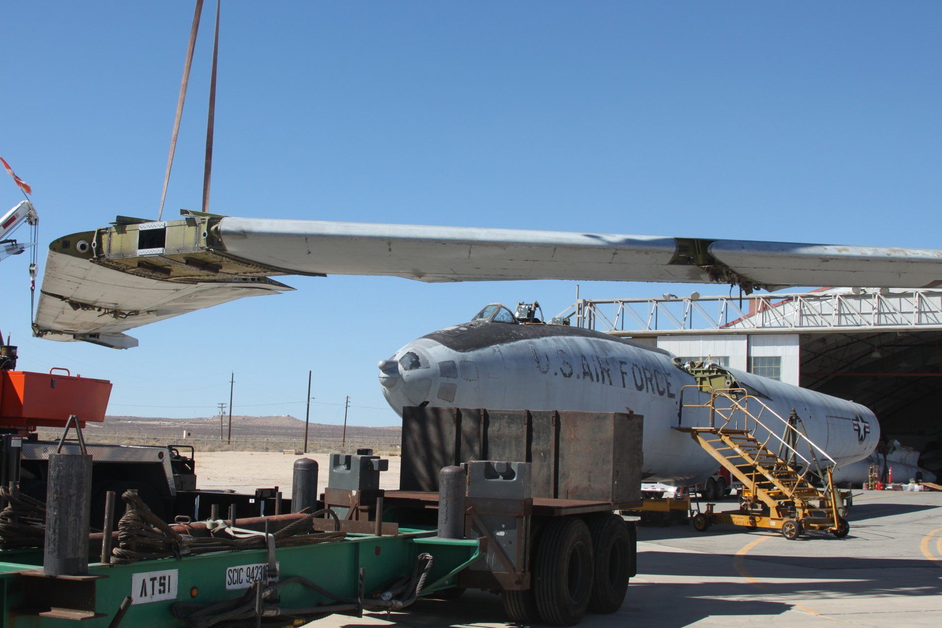US Airforce Plane Wing Lifted by a Crane — Lancaster, CA — Get Hooked Crane Service