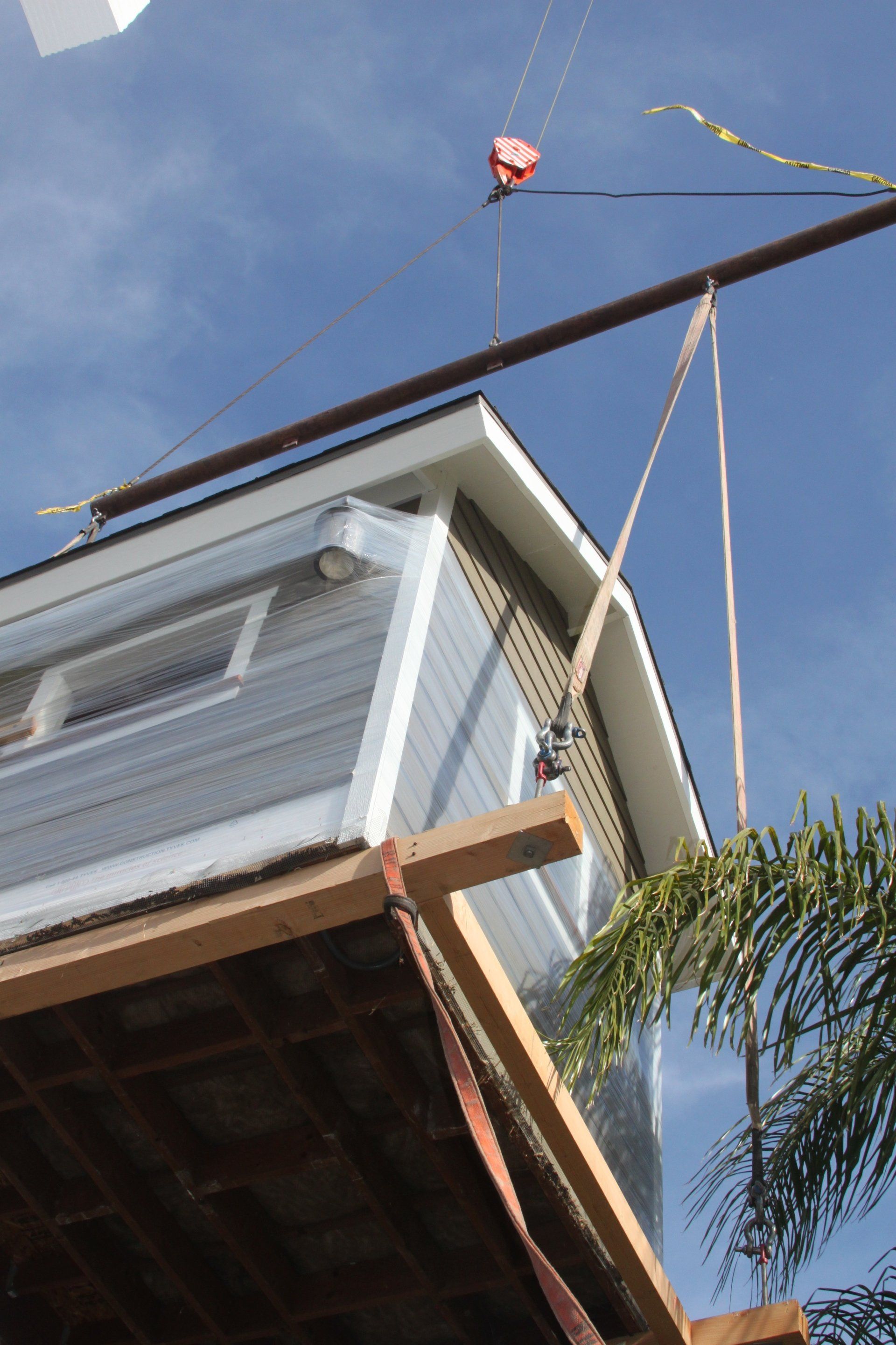 House Carrying by a Crane — Lancaster, CA — Get Hooked Crane Service