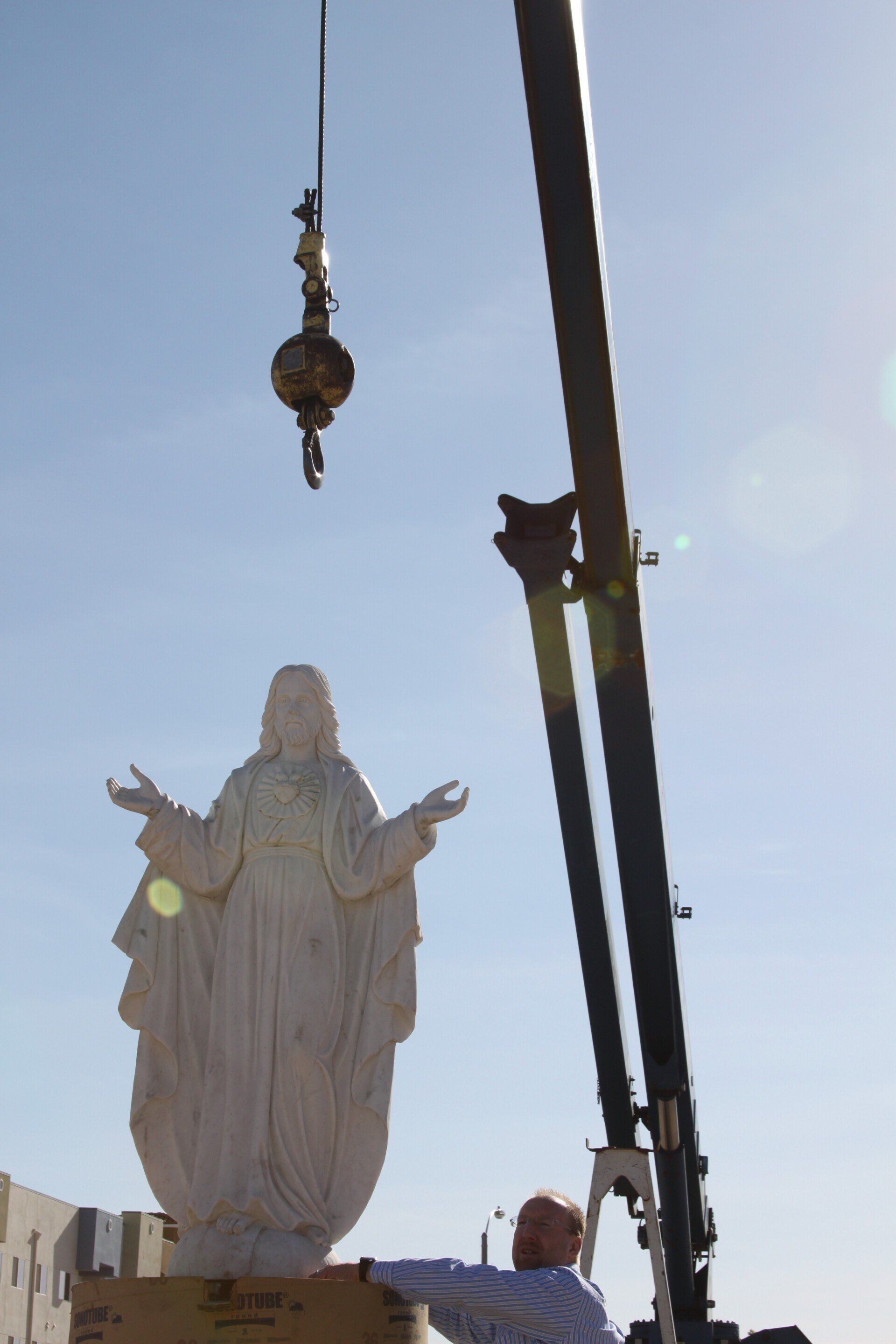 Statue Set by Crane — Lancaster, CA — Get Hooked Crane Service