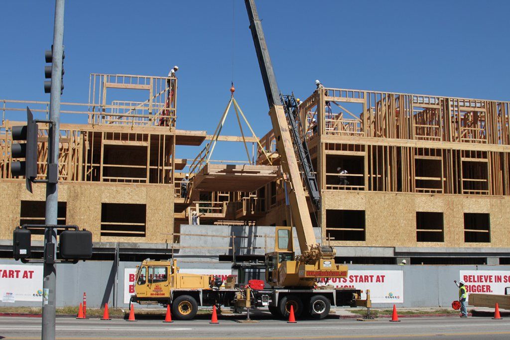 Crane in Wood Framing — Lancaster, CA — Get Hooked Crane Service