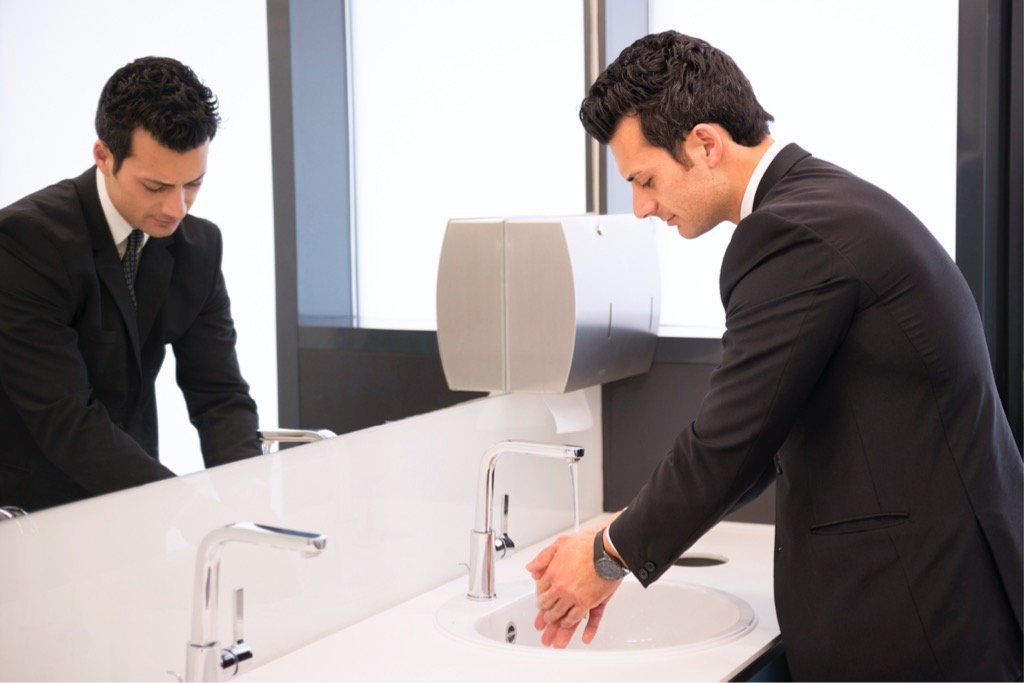 limousine driver washing hands