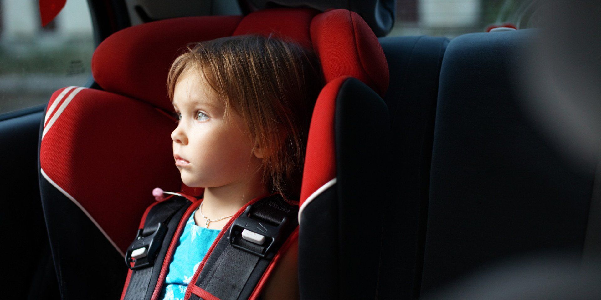 child in a limousine car seat