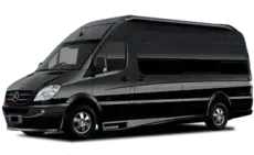A black mercedes van is parked on a white background.