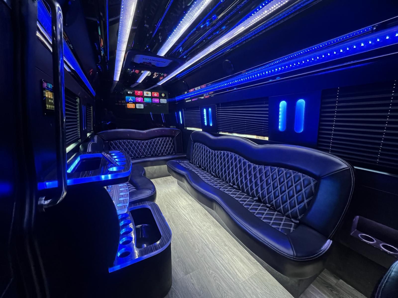 Interior of a luxury party bus with blue LED lights