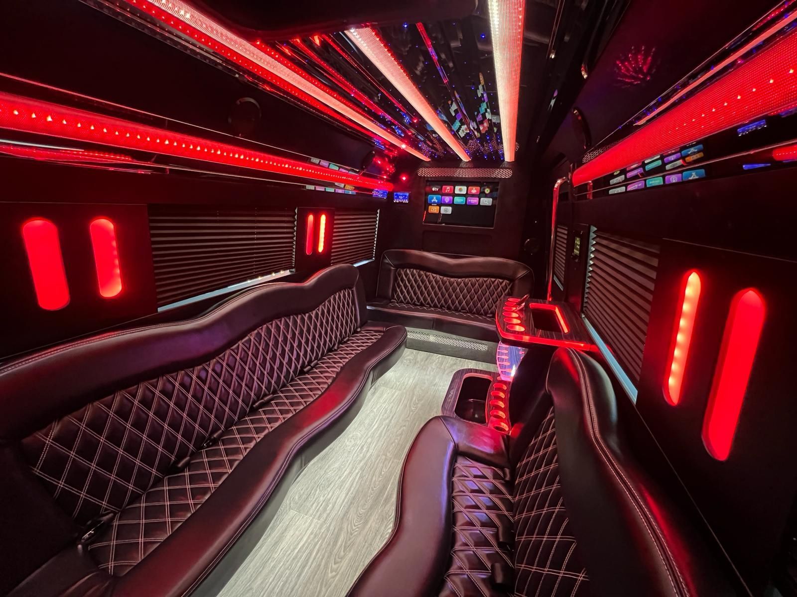 Inside a black limousine with red LED lighting