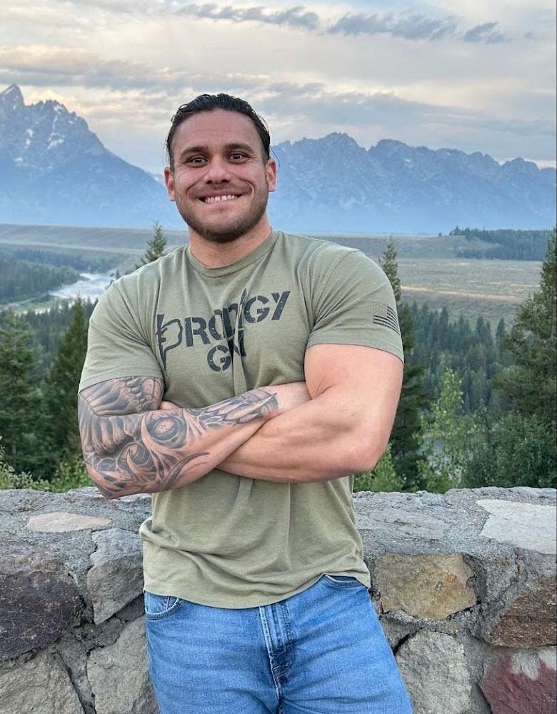 Joe Cantu, certified personal trainer, guiding clients at Prodigy Gym to achieve fitness goals with expert coaching.