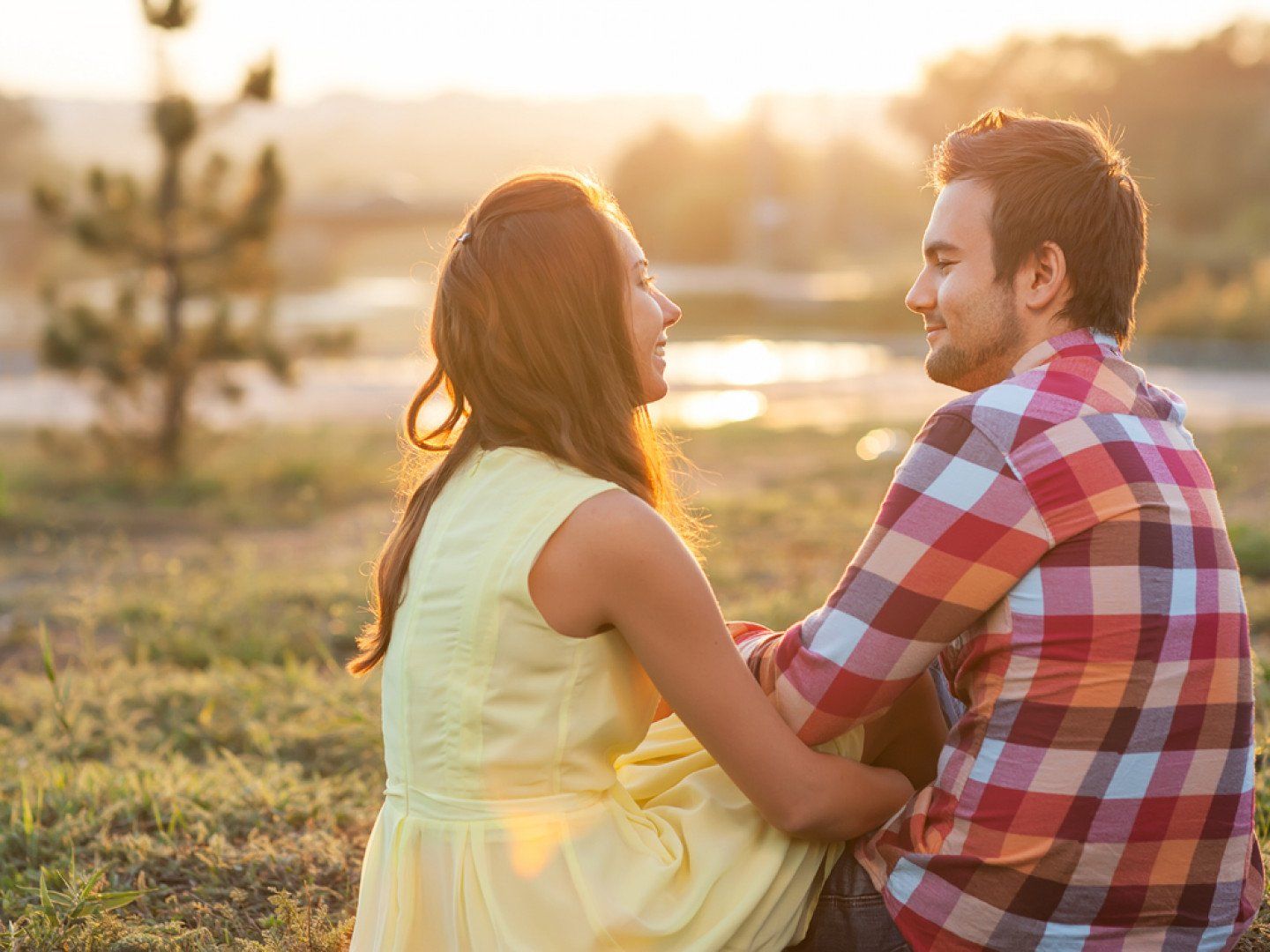 Happy Couple in Park During Sunset