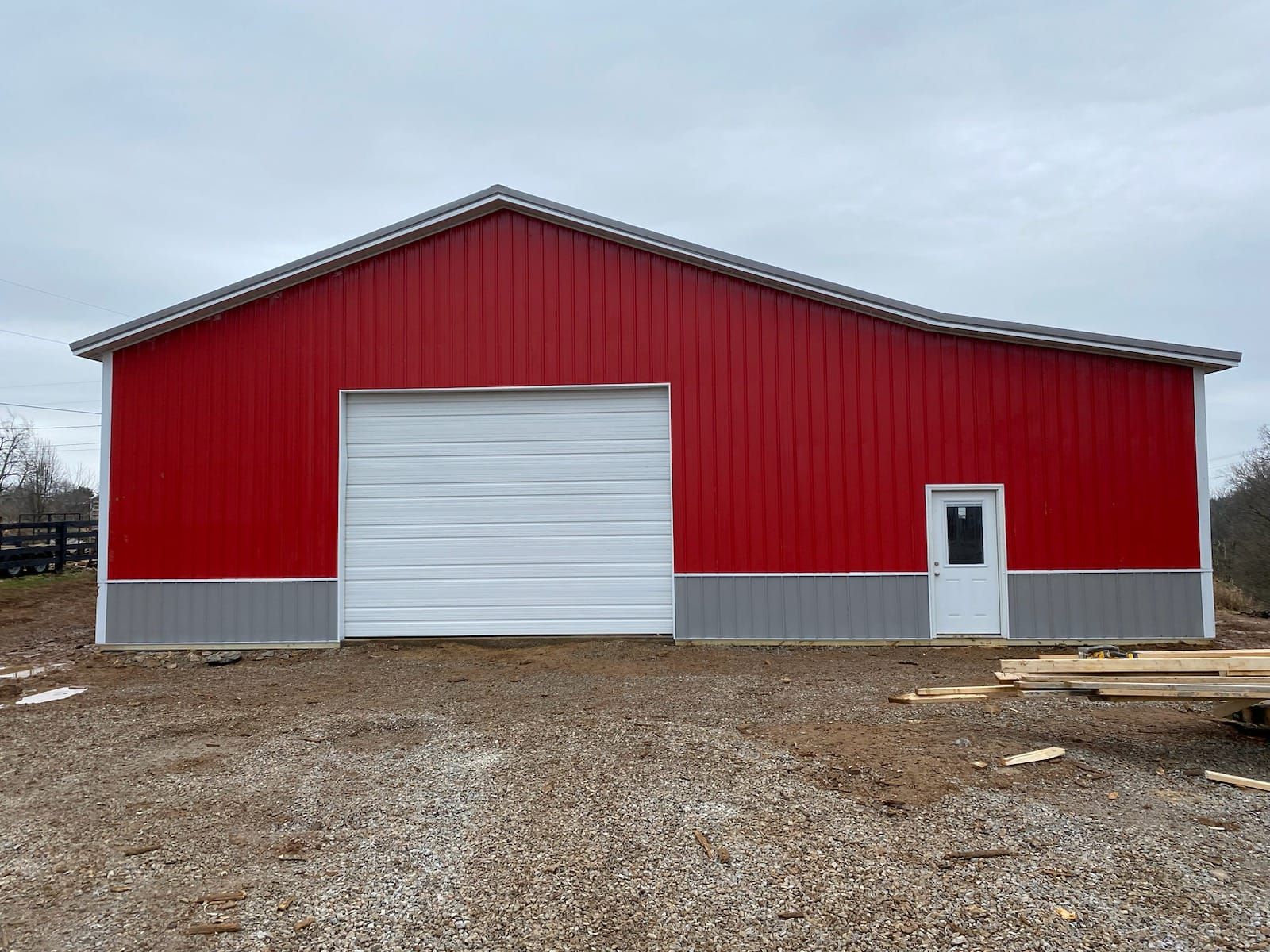 Red Barn with White Door — Lexington, KY — Pro Custom Construction