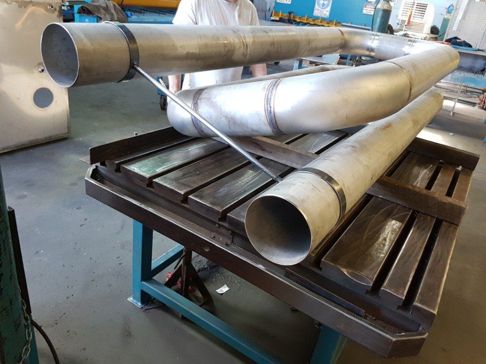 Metal pipe being welded