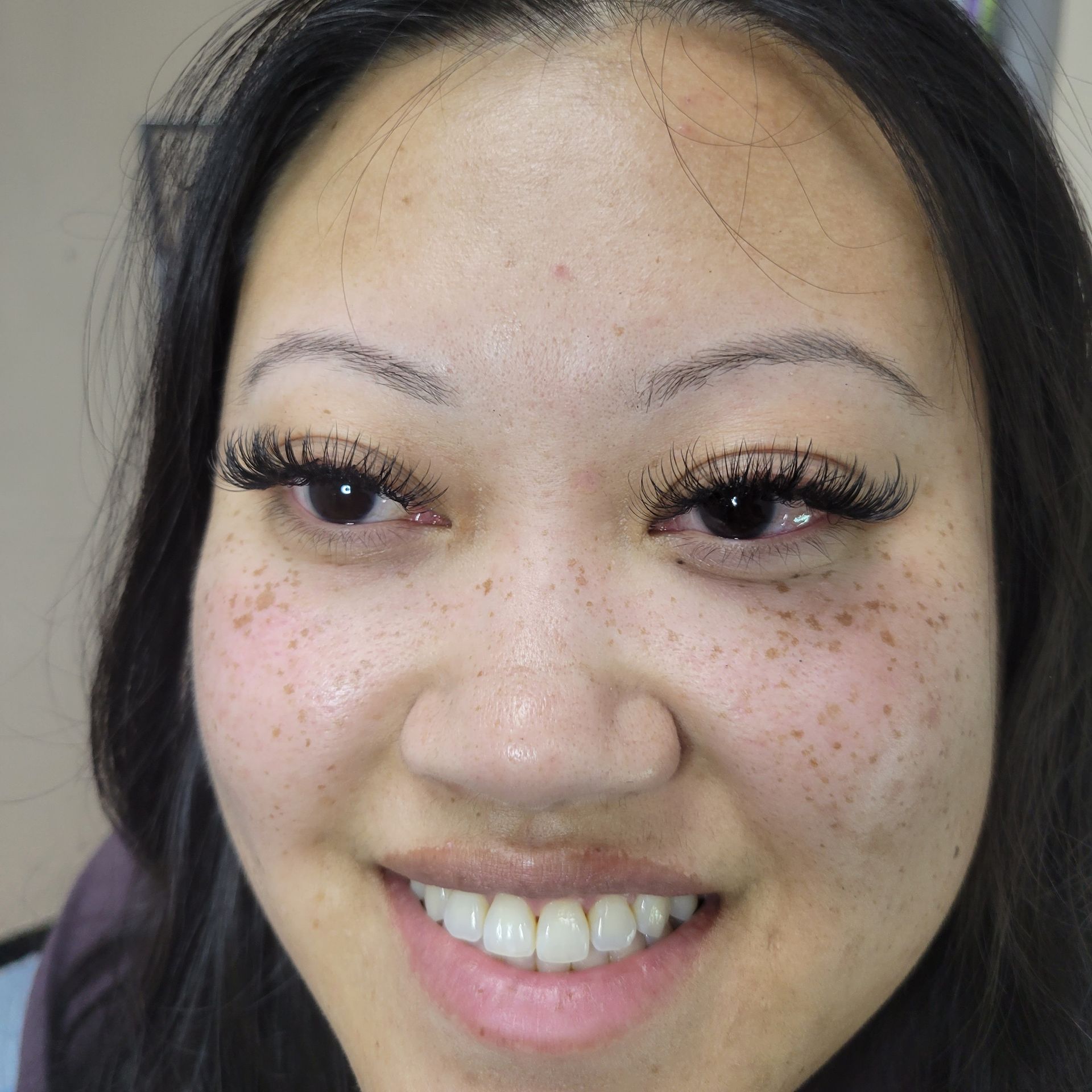 Smiling Woman with Beautiful Lashes - North Little Rock, AR - Sherrye’s Esthetics and Wellness Spa