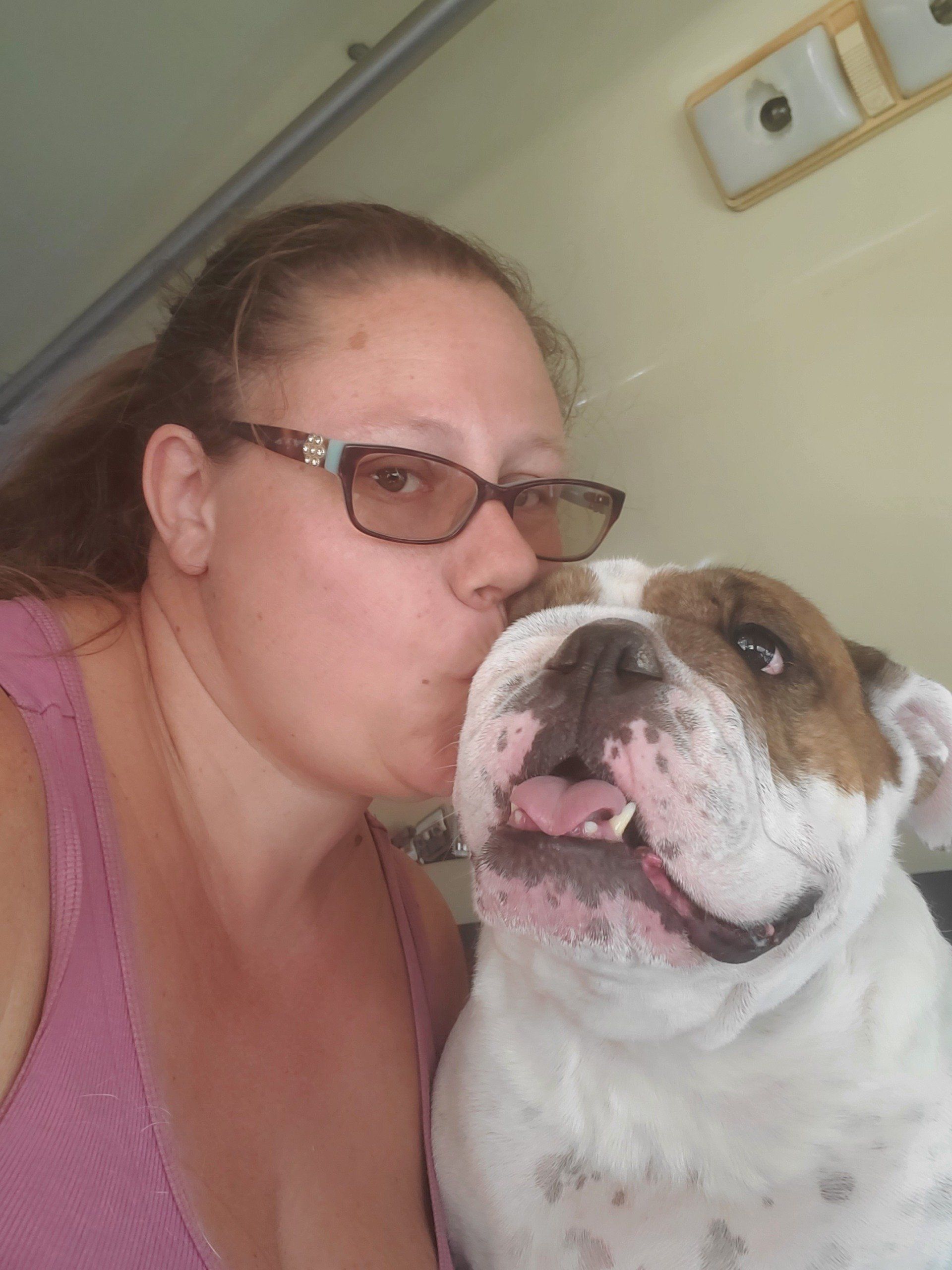 Woman Kissing Dog — Apache Junction, AZ — Dashing Groomer
