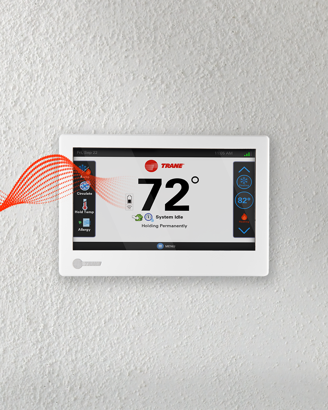 White wall-mounted thermostat display showing 72° with blue and orange side controls