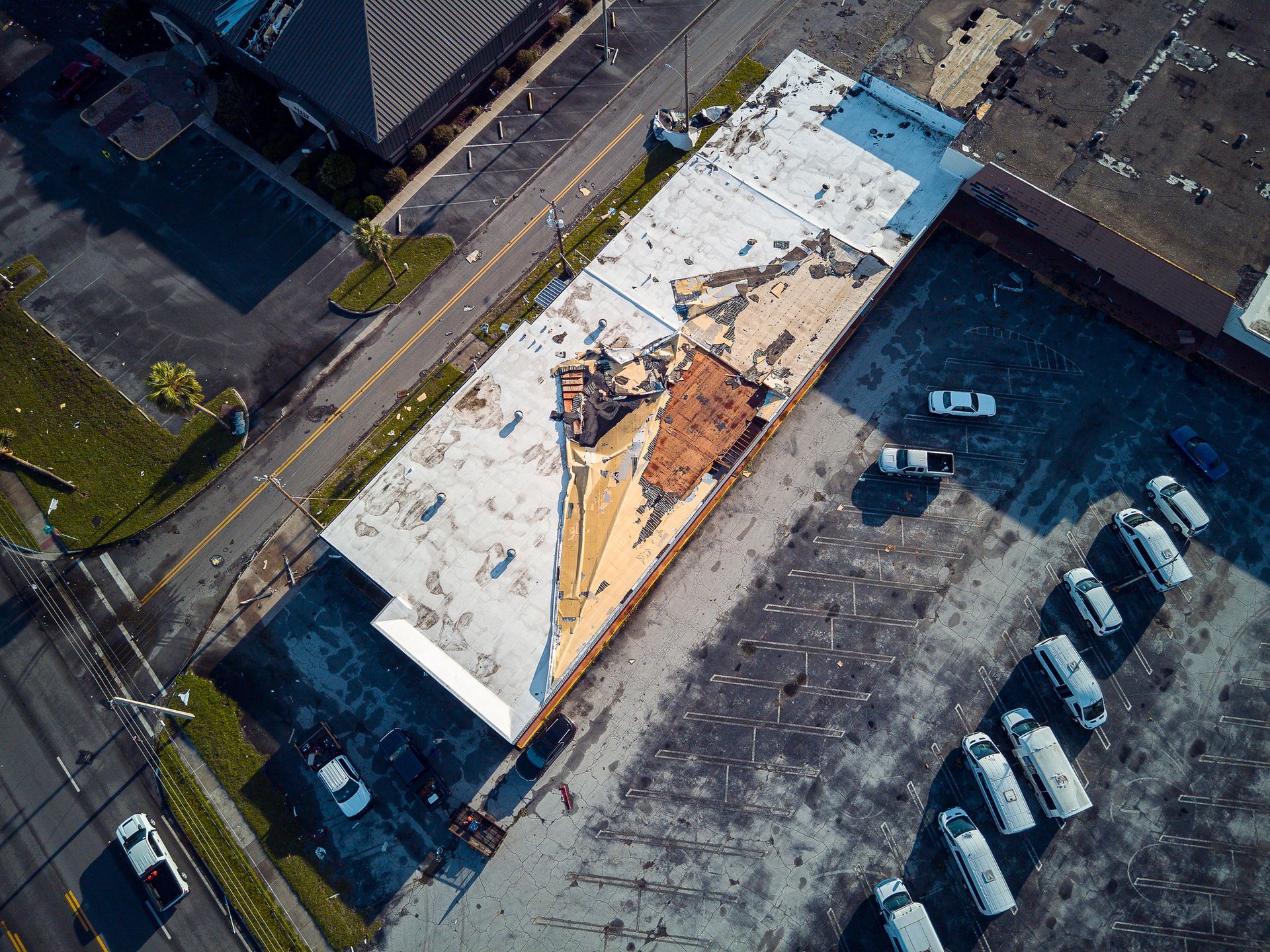 An aerial view of a building that is being demolished