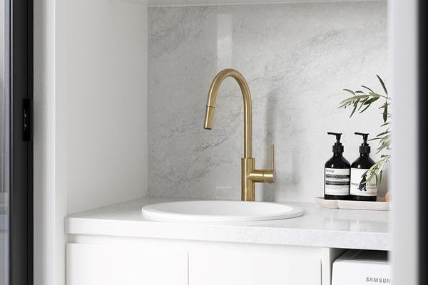 Gold Tapware With White Countertop — Fixtures & Fittings In Tweed Heads South, NSW