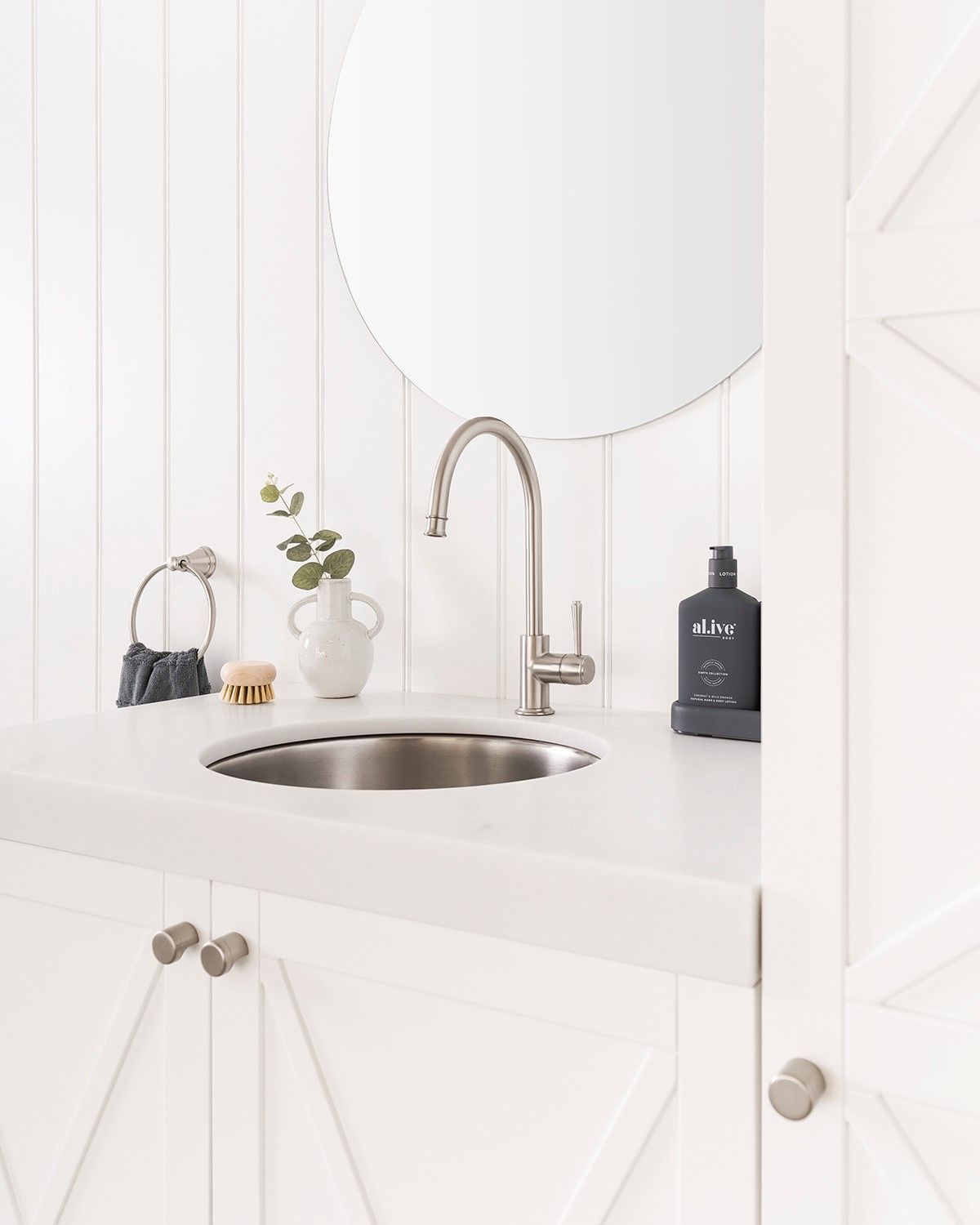 White Countertop With Cabinet And Mirror — Fixtures & Fittings In Tweed Heads South, NSW