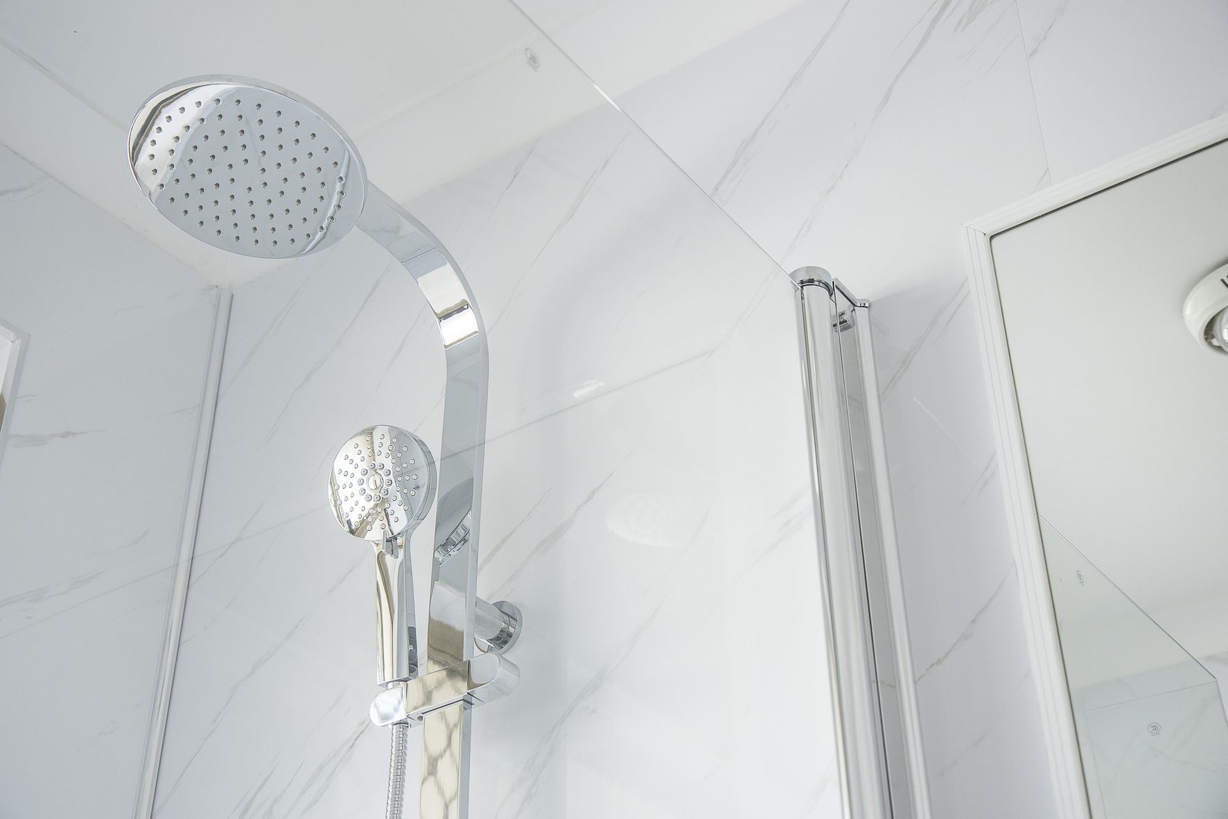 Bathroom With Silver Shower And White Wall Tiles — Fixtures & Fittings In Tweed Heads South, NSW