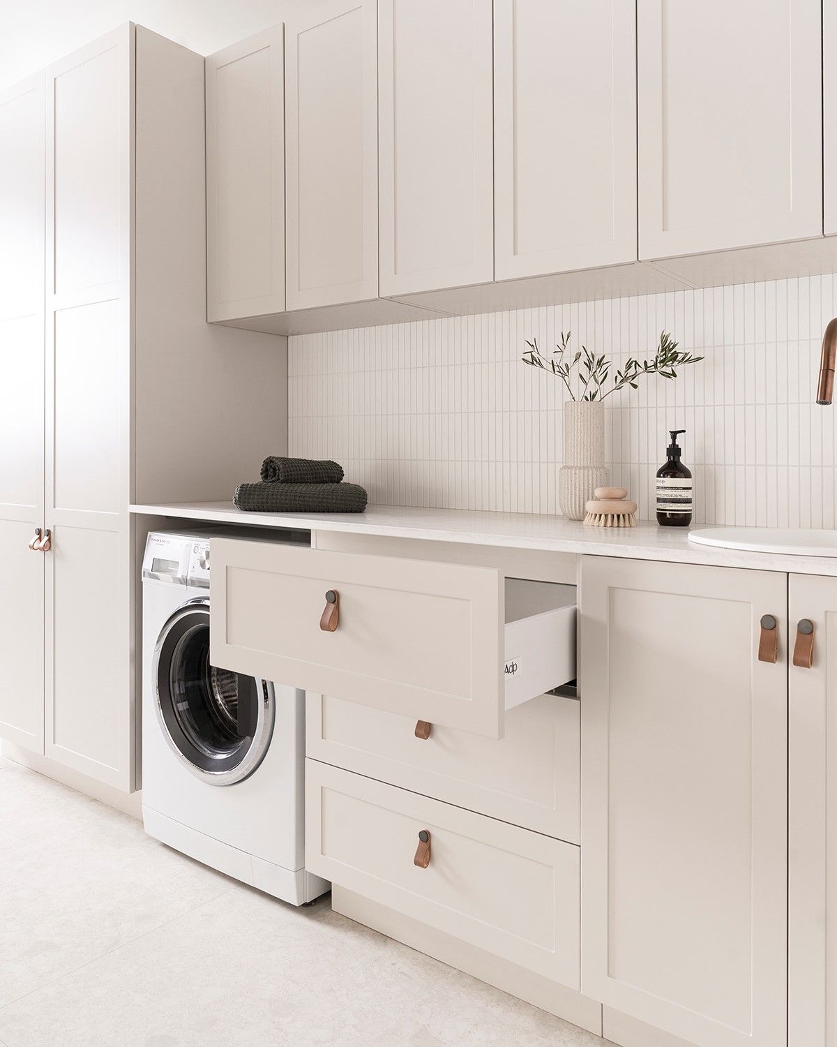 Laundry Area With Open Drawer Cabinet — Fixtures & Fittings In Tweed Heads South, NSW