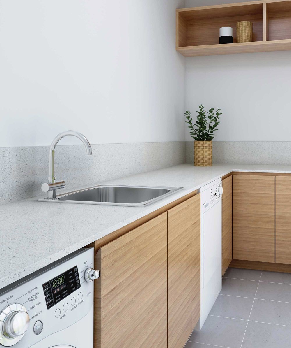 Grey Countertop With Sink In The Laundry Area — Fixtures & Fittings In Tweed Heads South, NSW