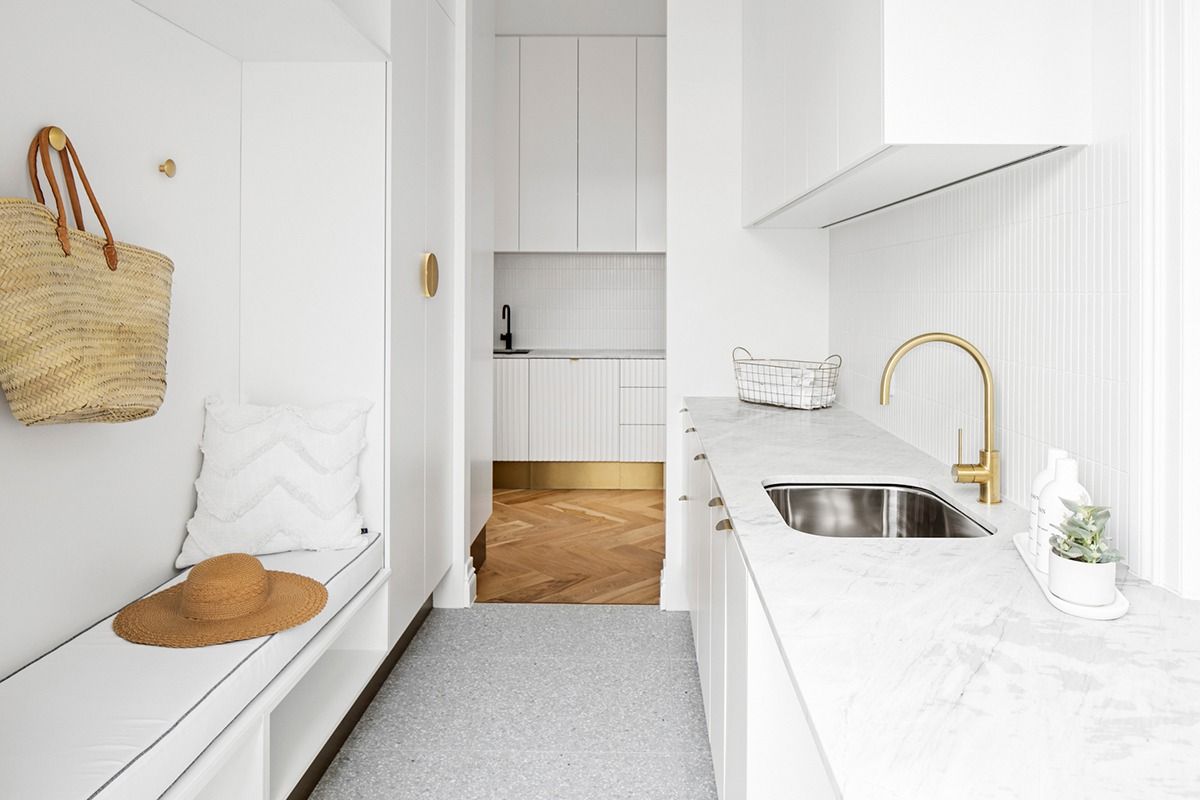 Laundry Area With White Cabinets — Fixtures & Fittings In Tweed Heads South, NSW