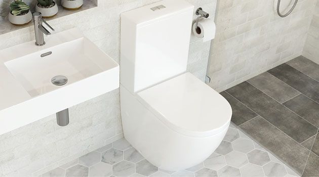 White Toilet With Tissue On The Side — Fixtures & Fittings In Tweed Heads South, NSW