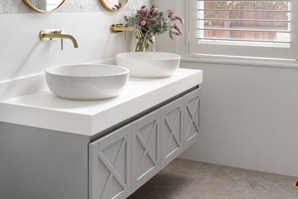 Bathroom With Vanity And Grey Cabinet — Fixtures & Fittings In Tweed Heads South, NSW