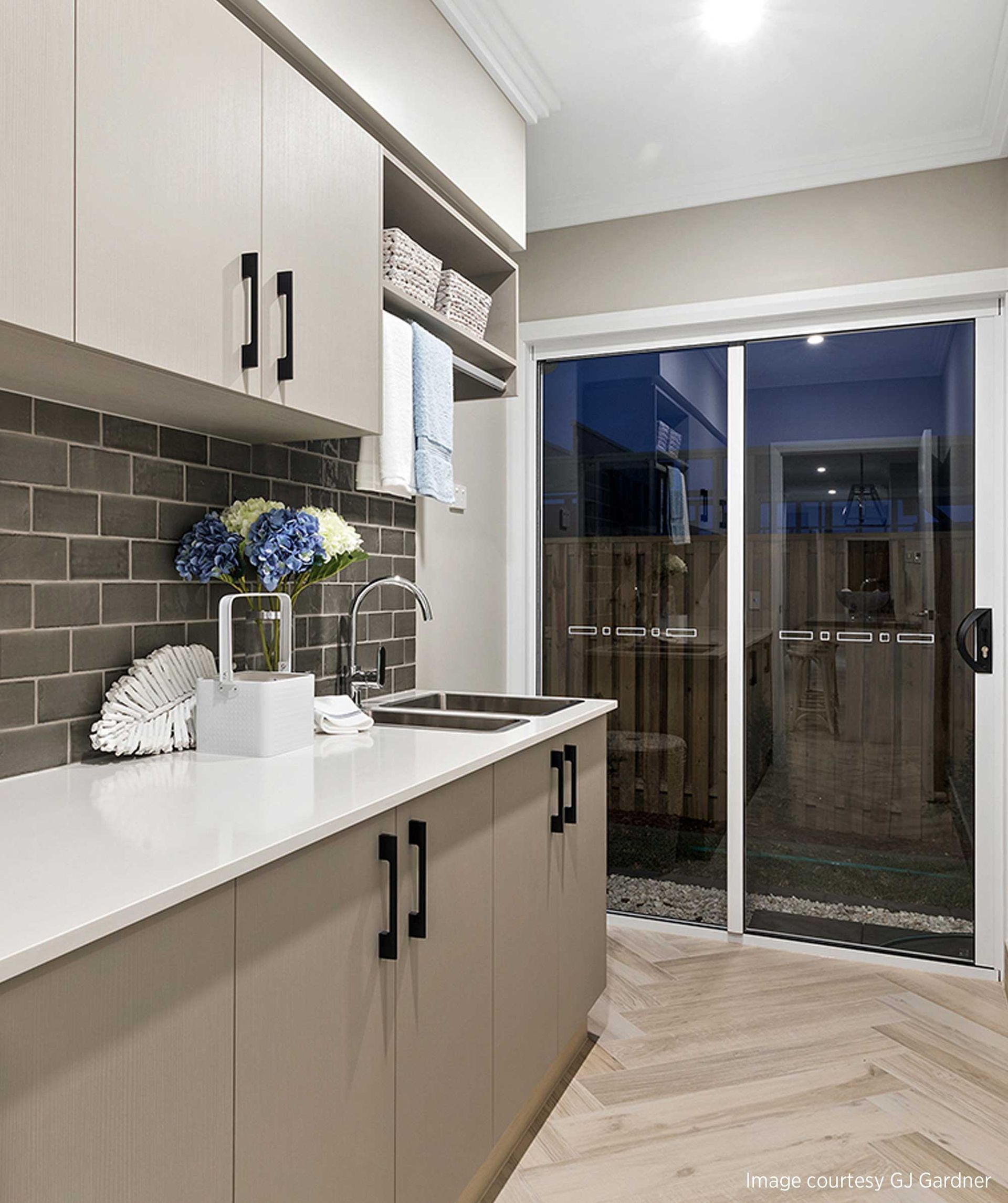 Laundry Area With Cabinets — Fixtures & Fittings In Tweed Heads South, NSW