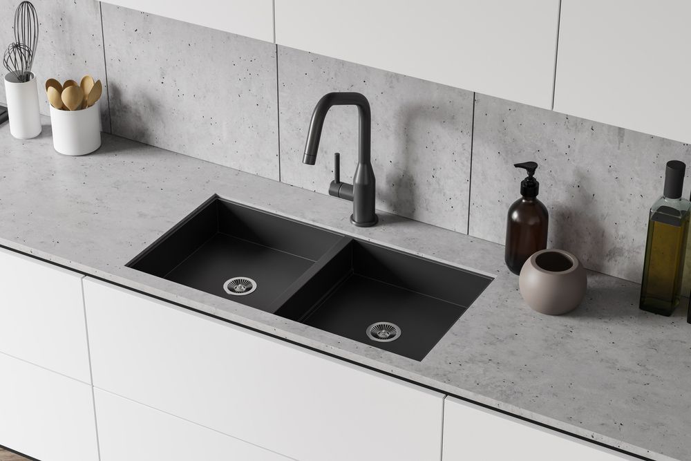 A Kitchen With A Black Sink And White Cabinets — Fixtures & Fittings In Tweed Heads South, NSW