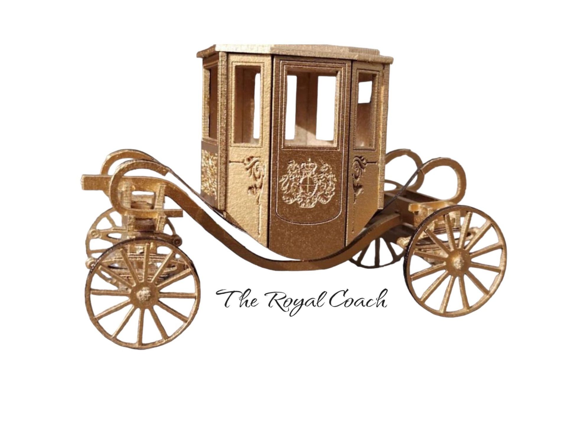 Gold-colored royal coach model with intricate details, sitting on a white background. Text reads 