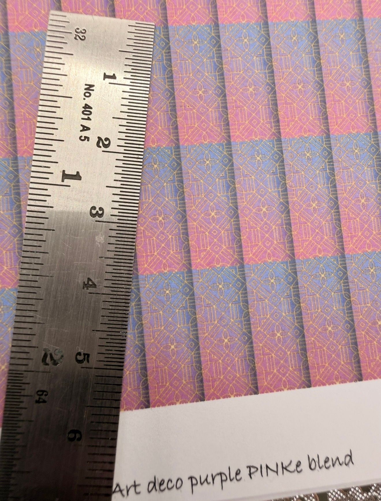 Wallpaper/fabric Art Deco purple/pink blend.