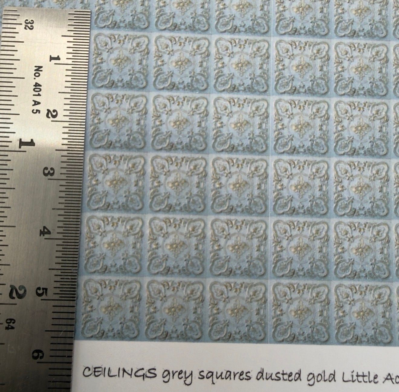 Wallpaper/fabric. Ceiling. Grey squares dusted gold