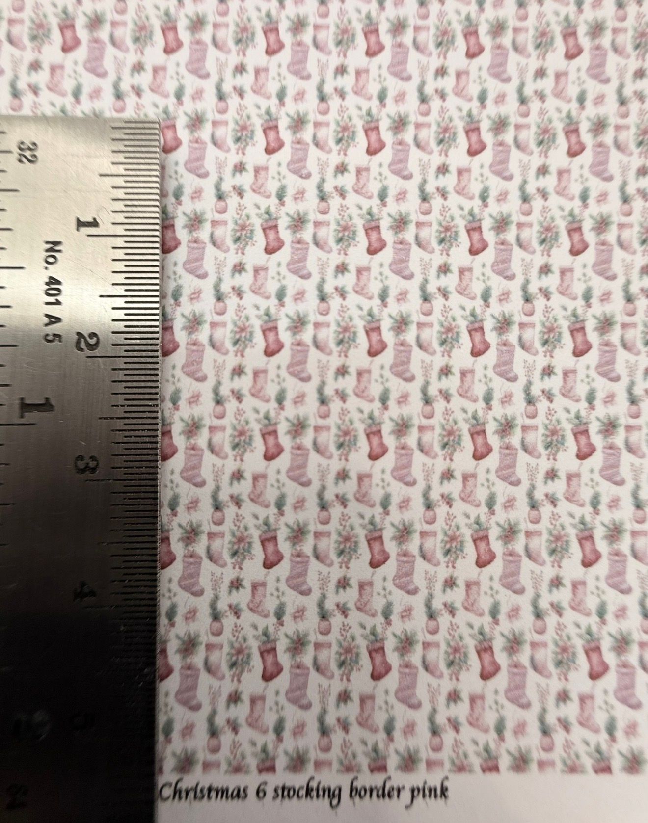Wallpaper/fabric. Christmas 6 stocking border pink. 1/48 scale